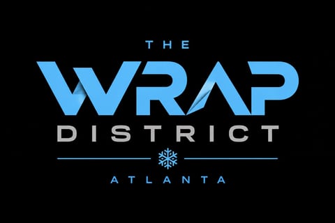 The Wrap District Atlanta logo in blue text with snowflake symbol on black background